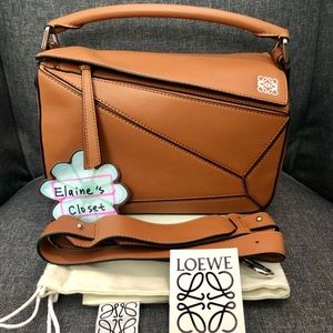 Loewe Small puzzle with four feet and wide strap